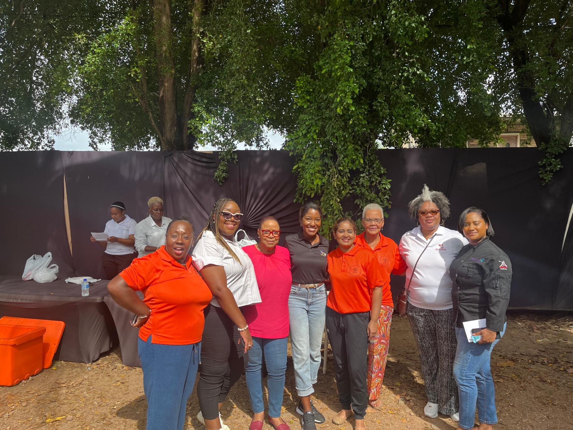 Group photo of the board of directors and speakers at an Arouca Soul Kitchen event in Trinidad